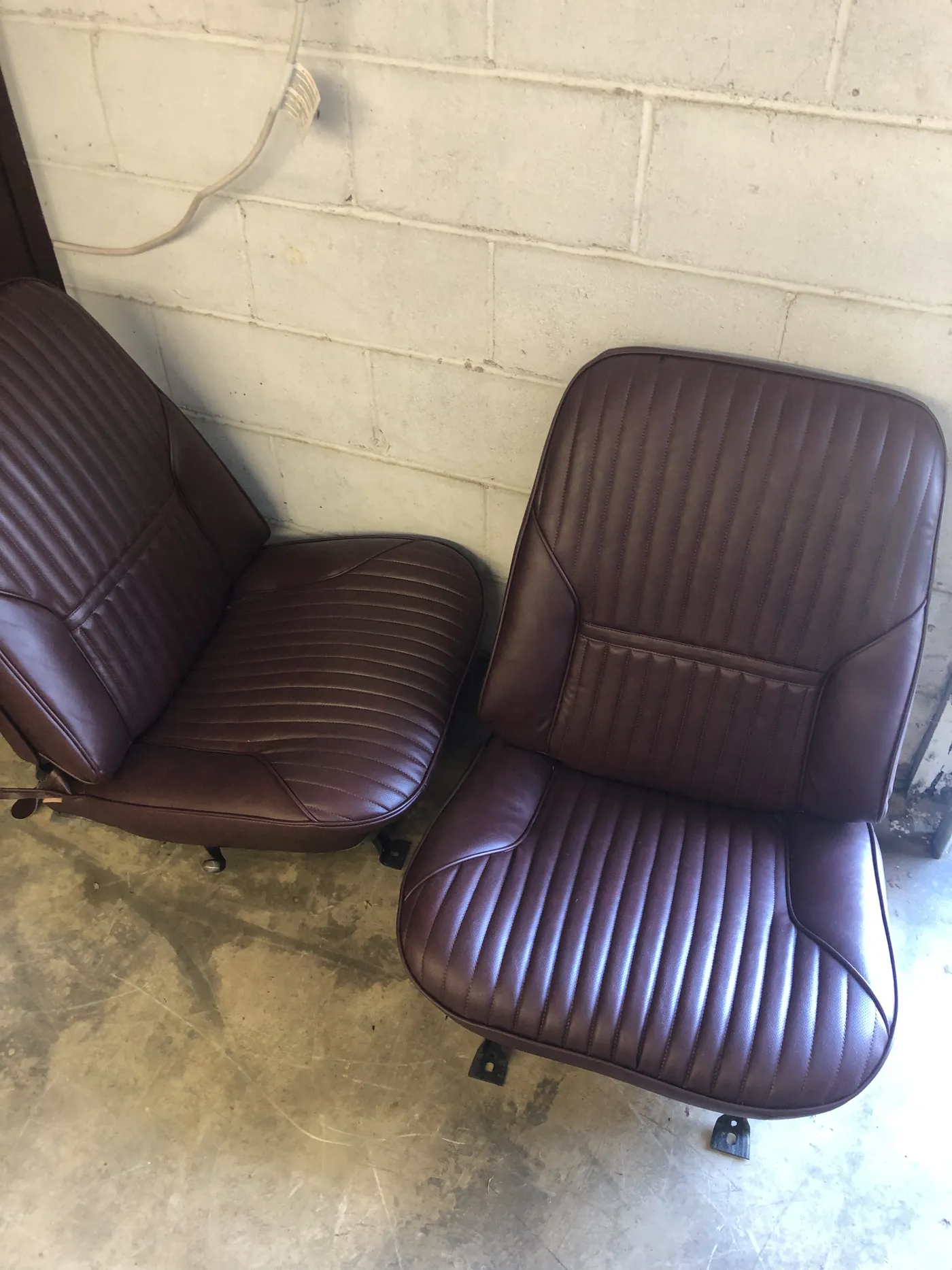 The same two bucket seats recovered in burgundy