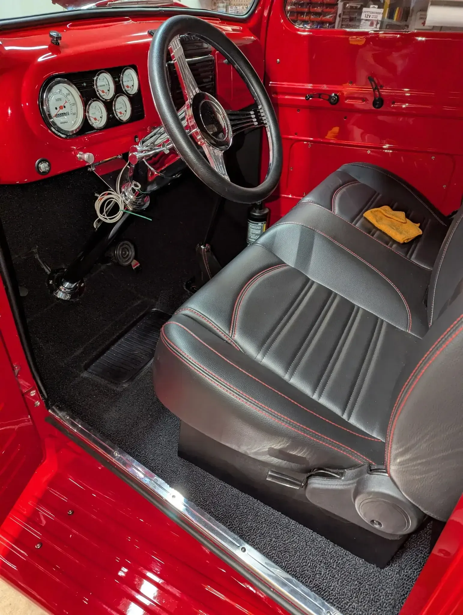 Truck cab — black seat, red stitch