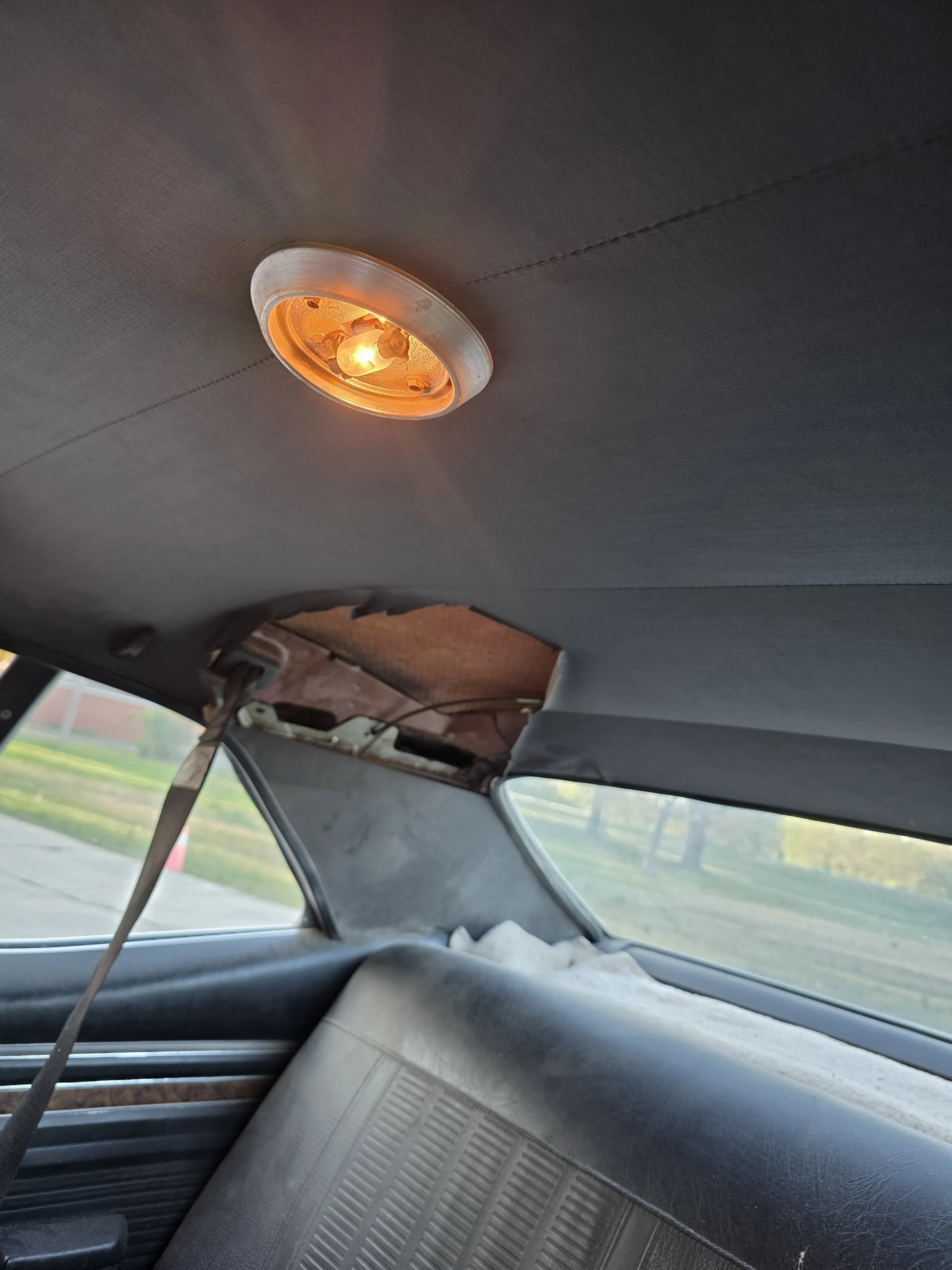 A sagging headliner photographed from a second angle