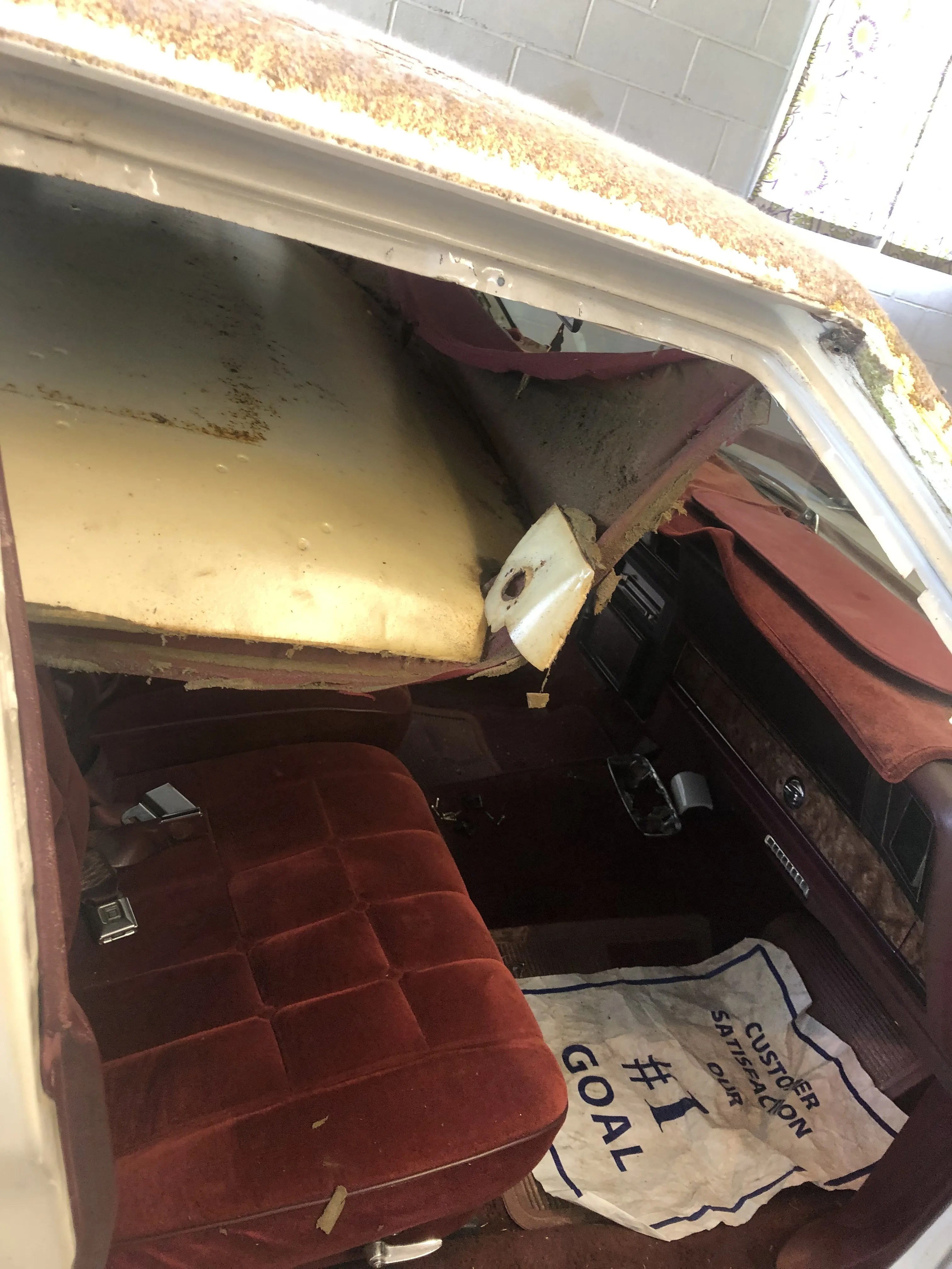 Before — rusted roof edge close