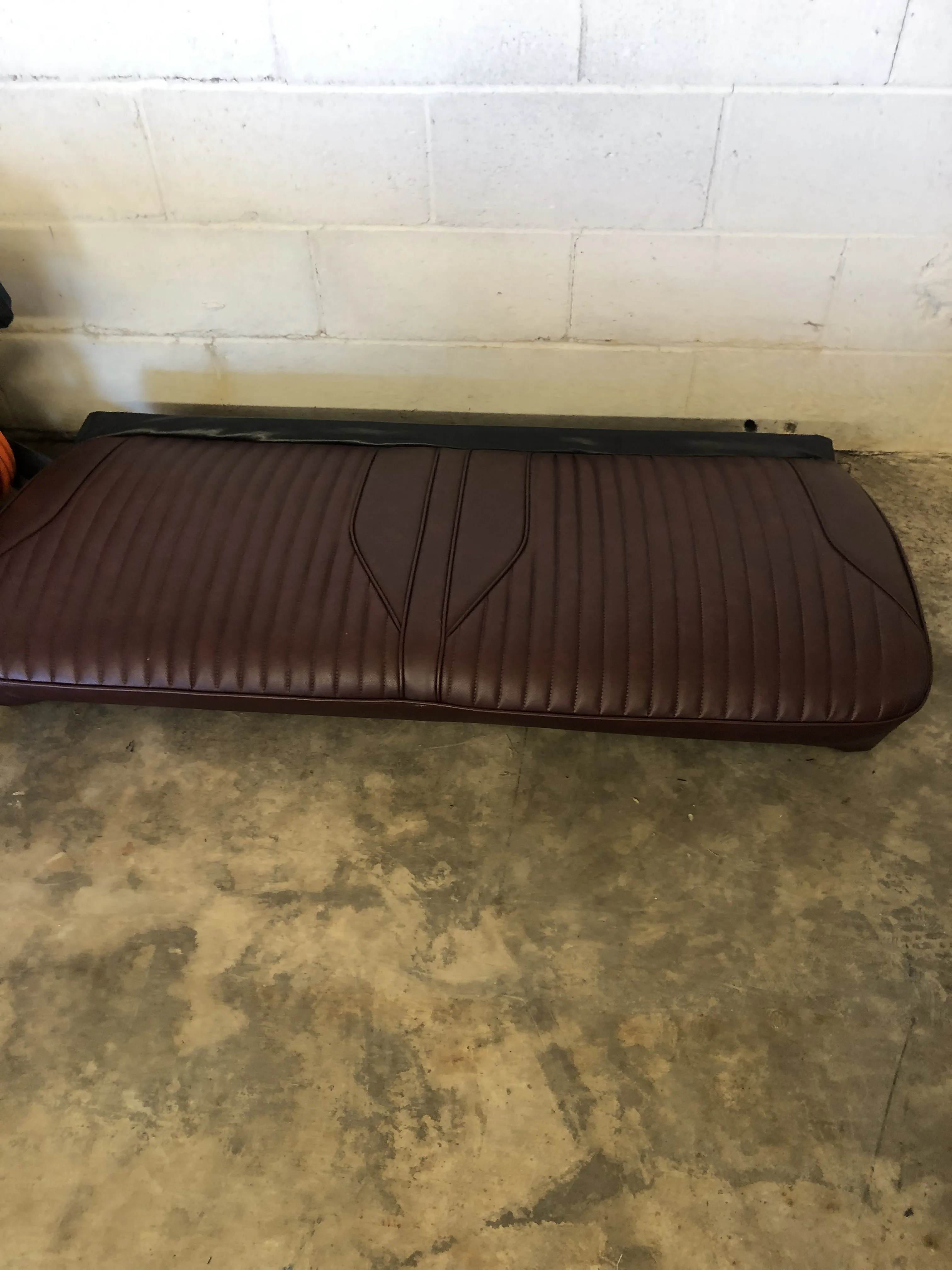 After — burgundy pleated bench