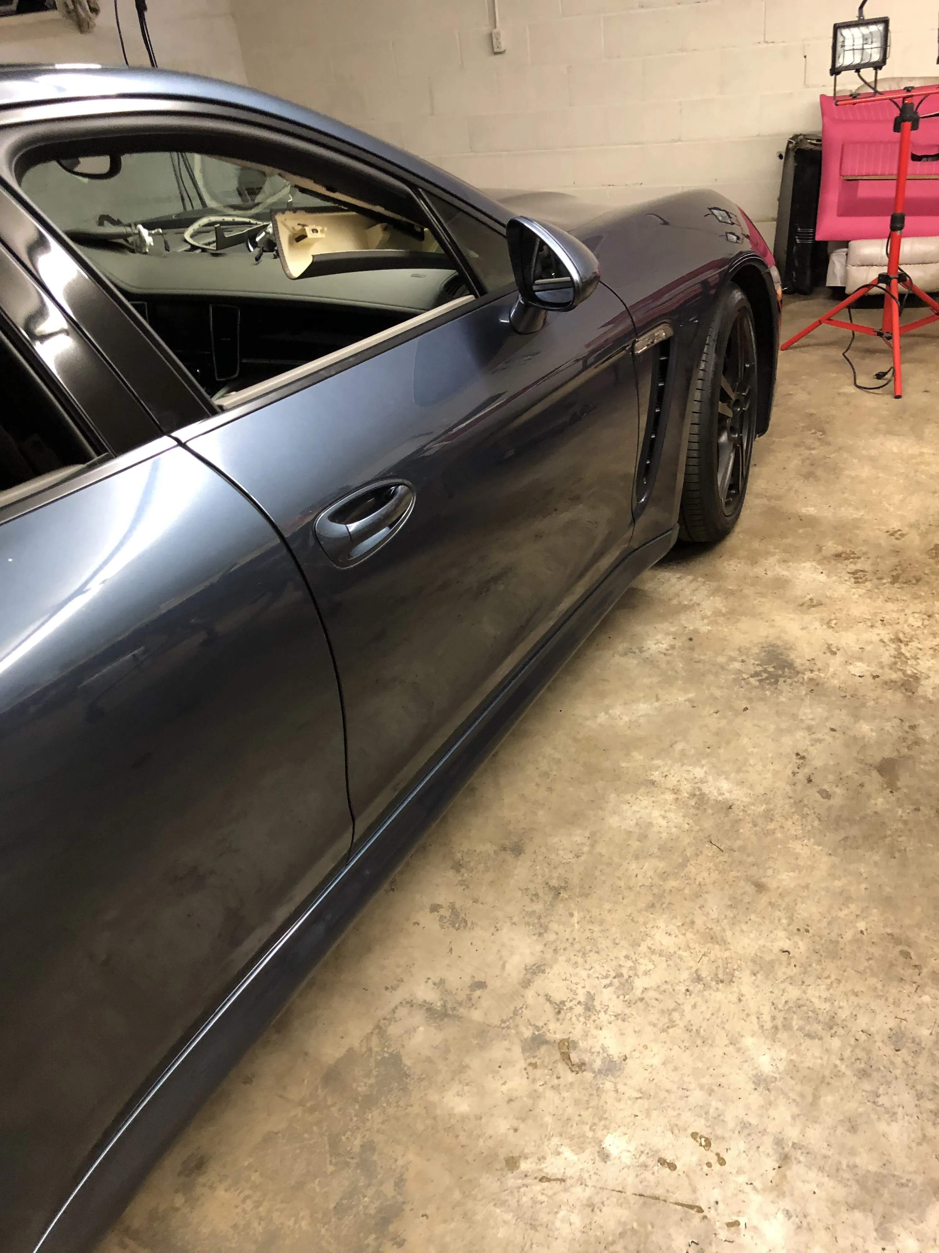 Grey porsche in bay