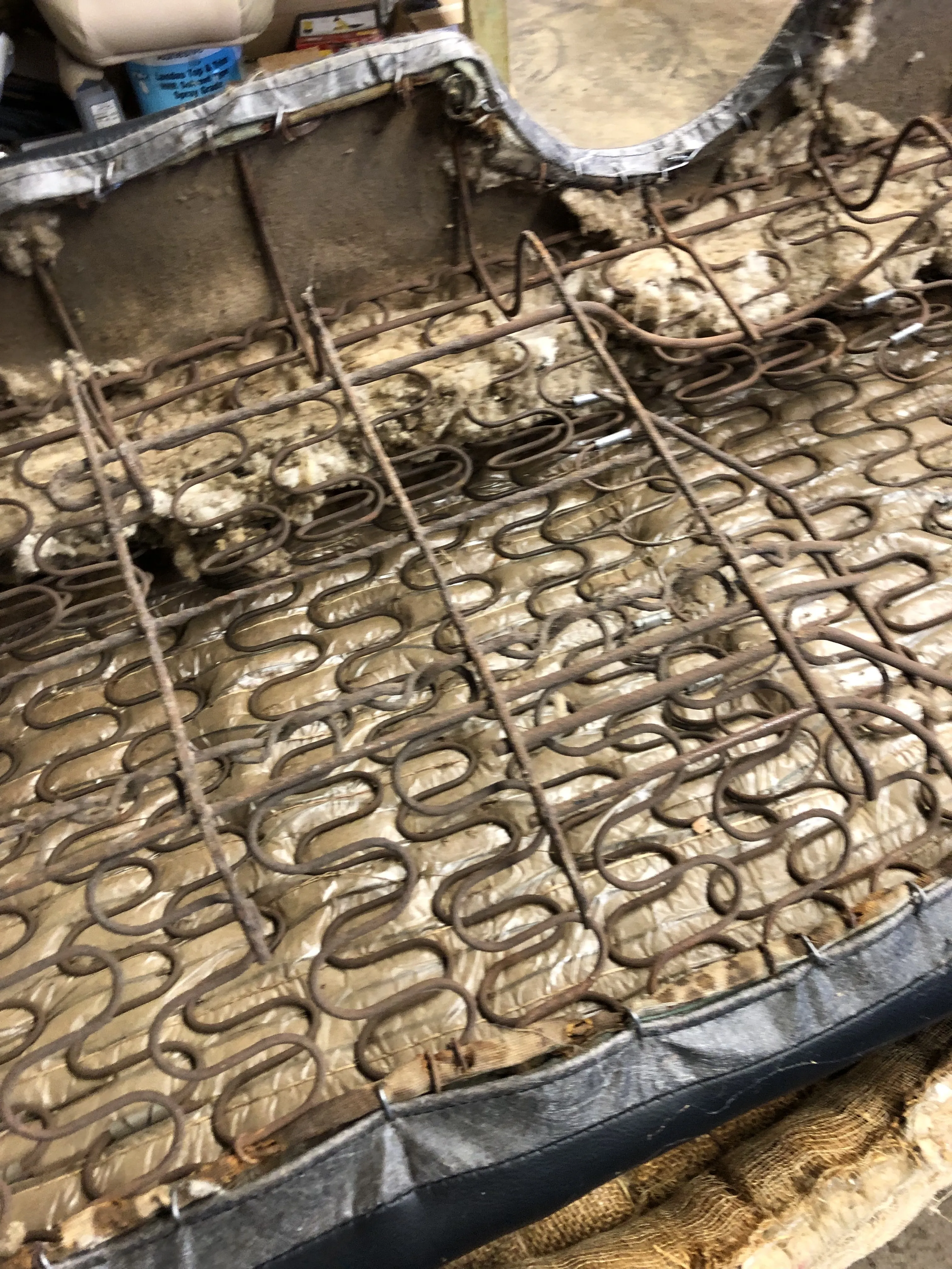 Before — bare springs and webbing