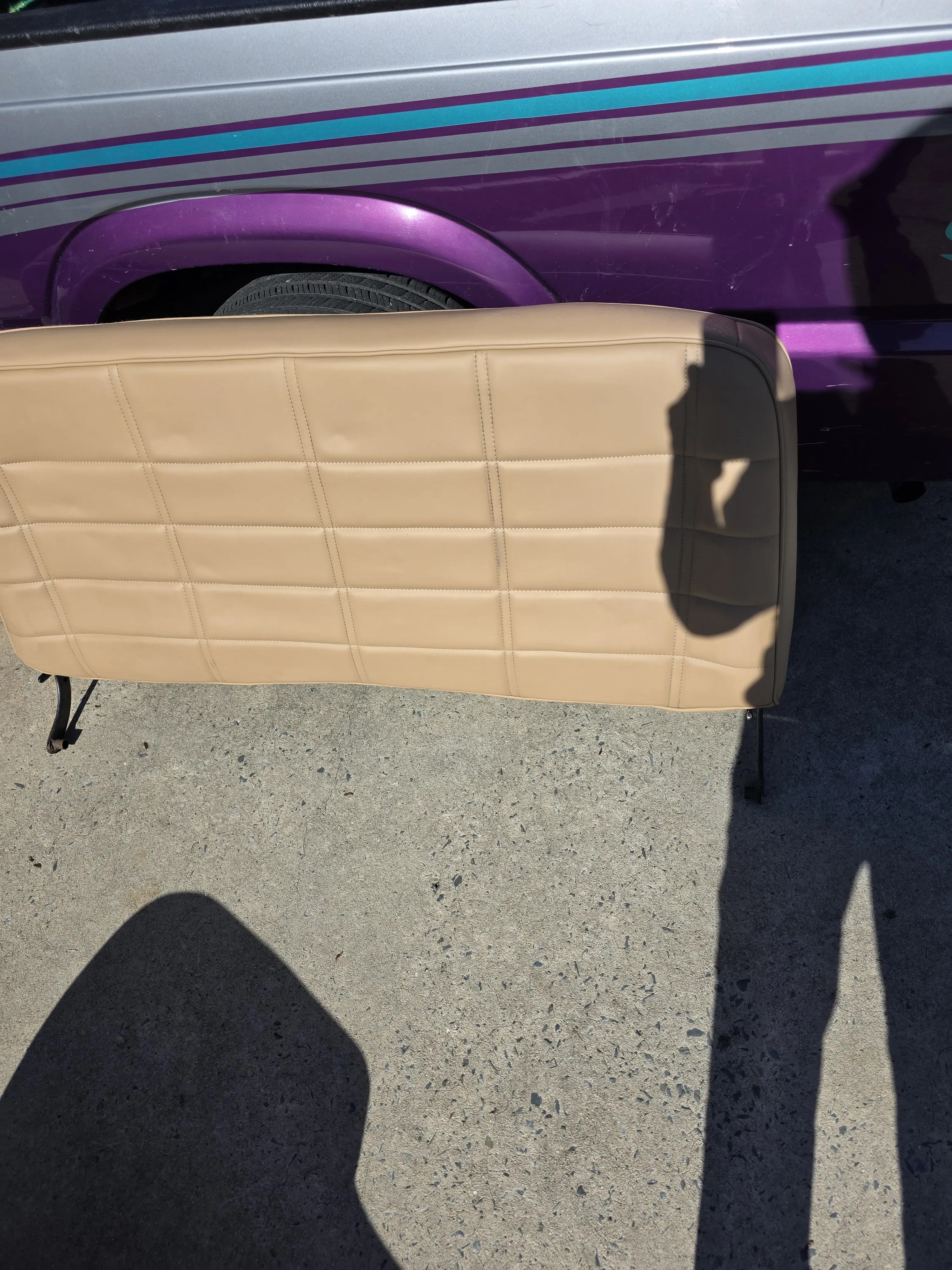 After — tan panel by purple car