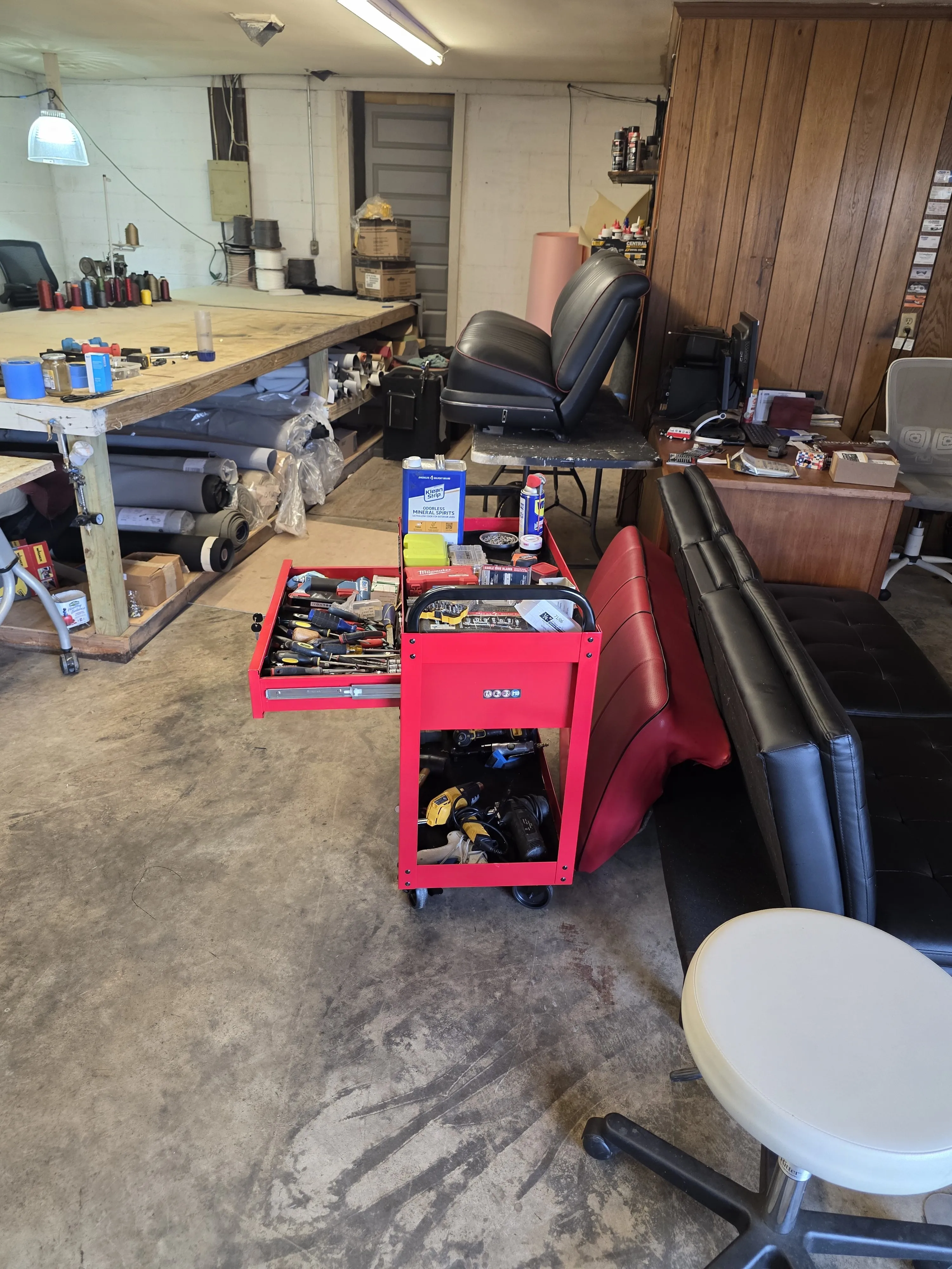 The shop floor, benches and tool cart