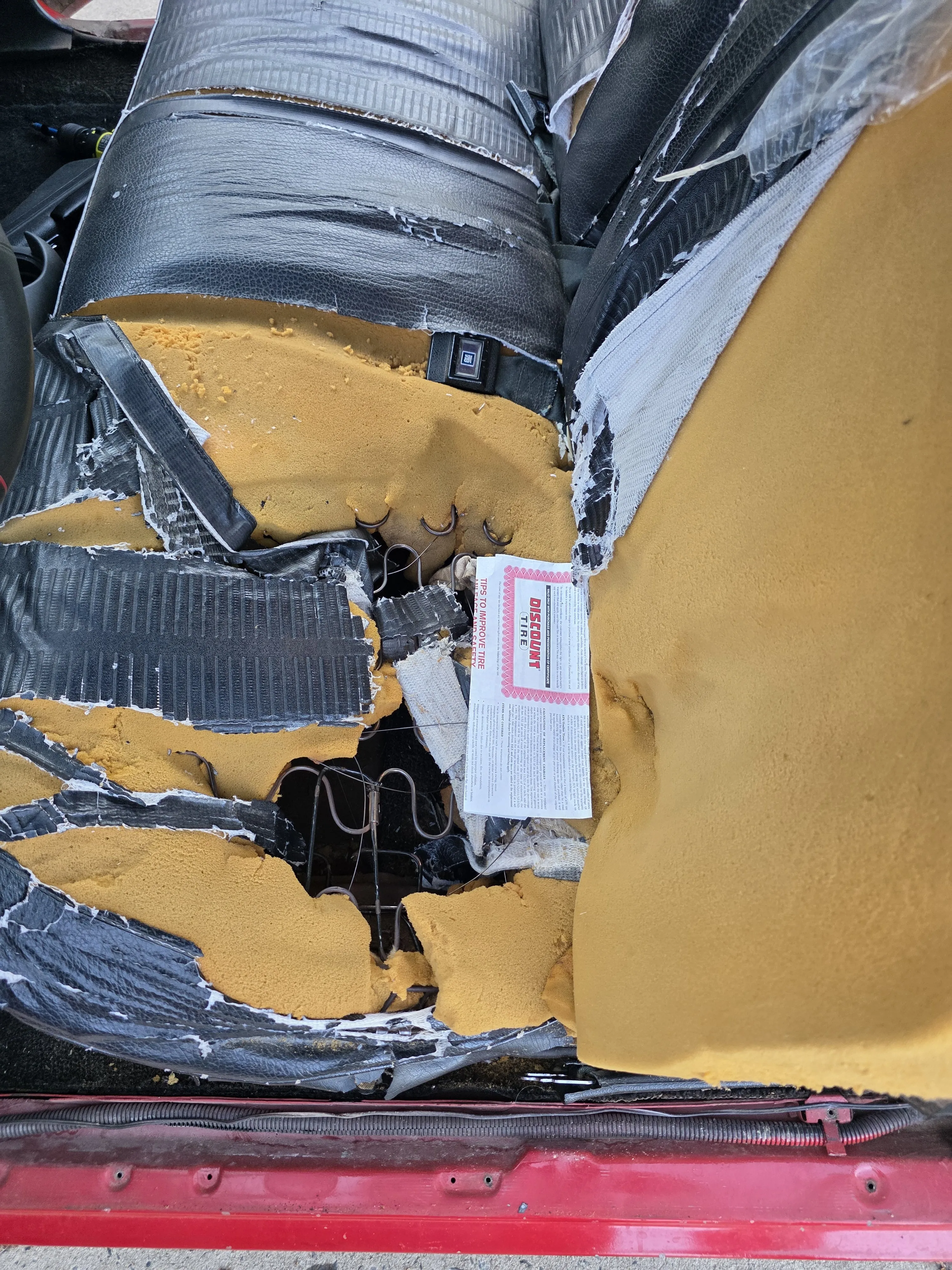 Before — seat back destroyed foam out