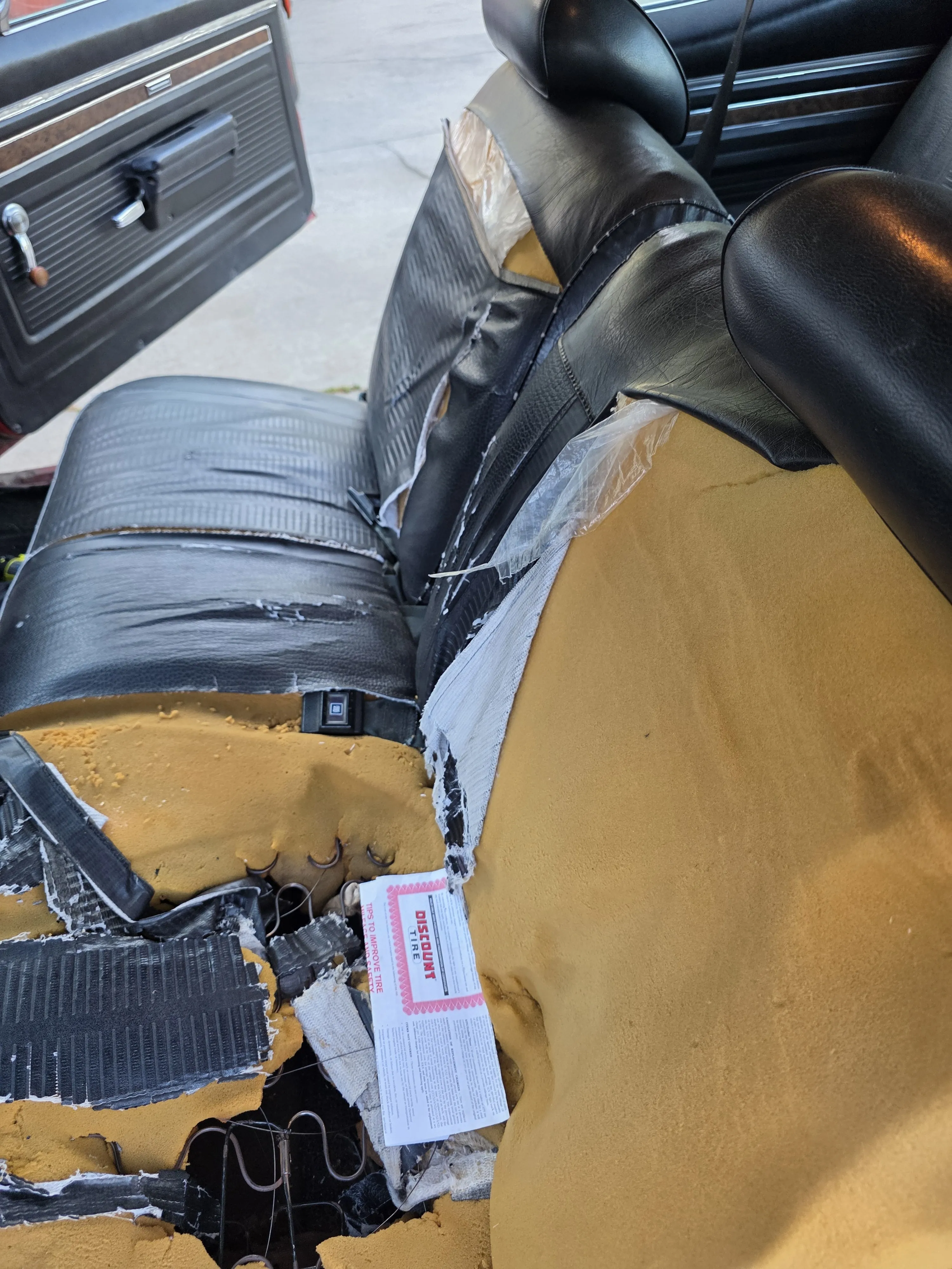 Before — black seat torn foam out