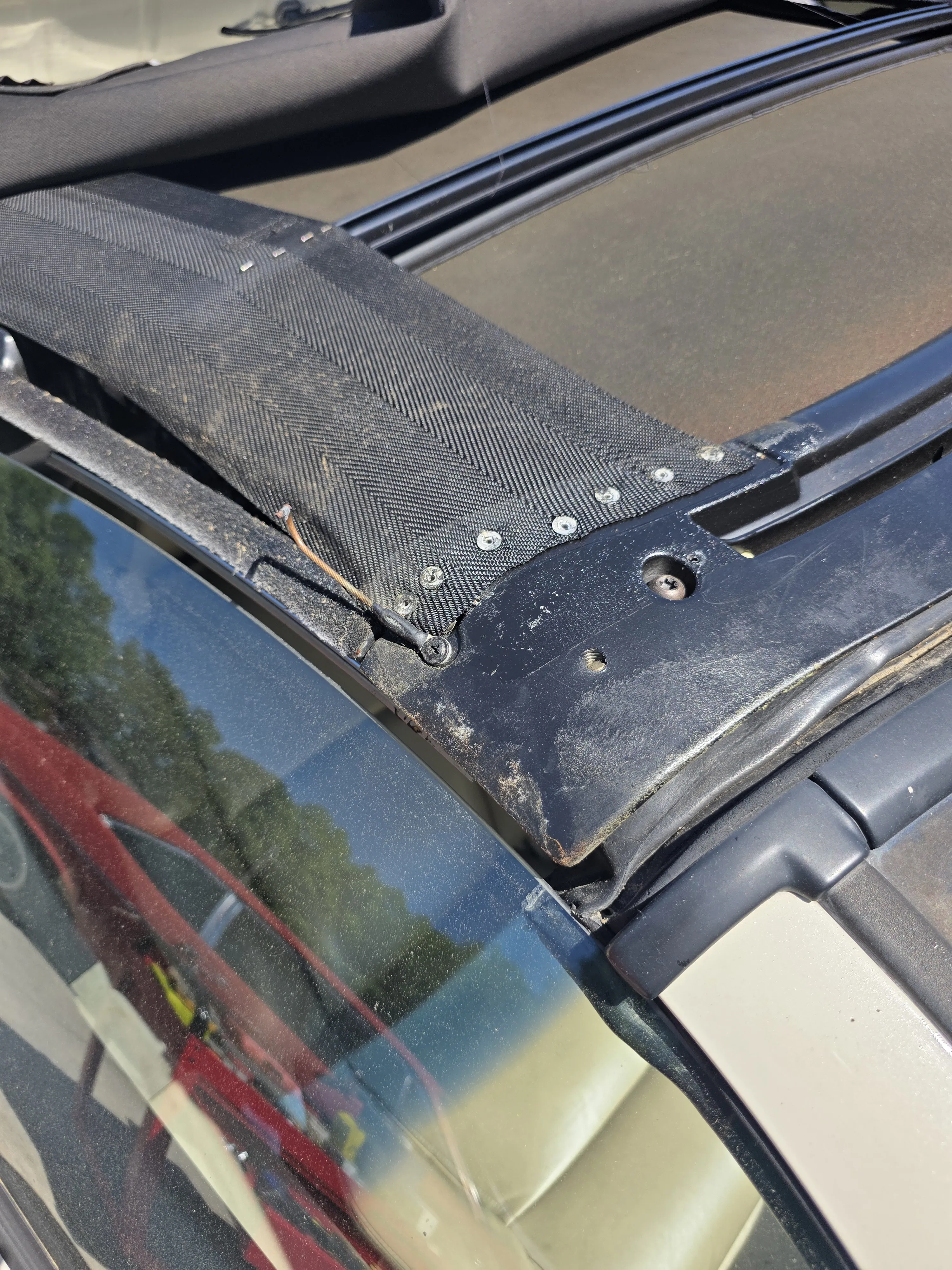 Before — old material stapled to frame