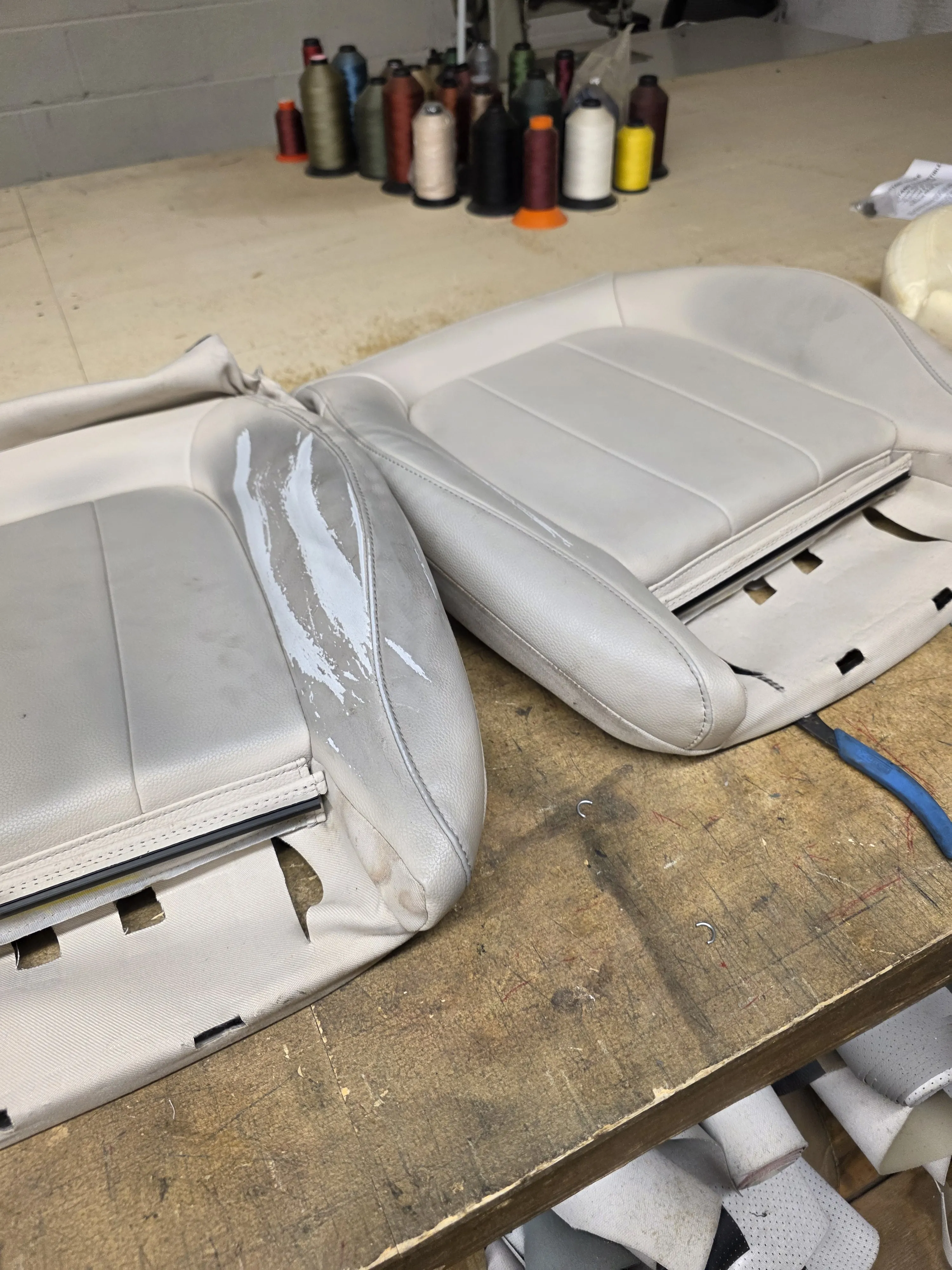 Cream cushions and thread