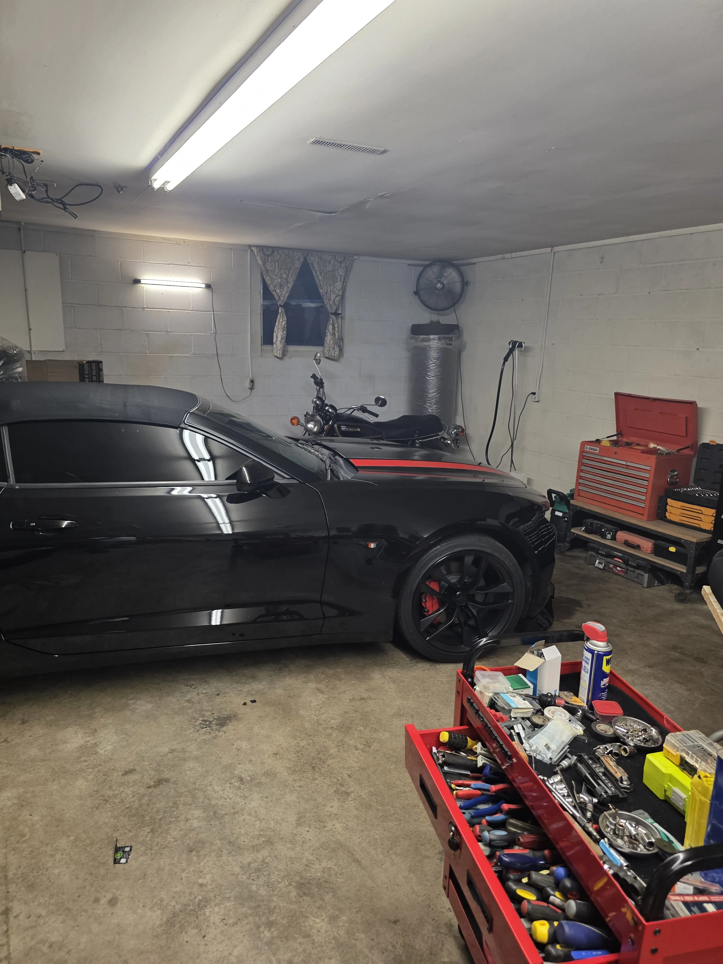 Camaro in bay top work