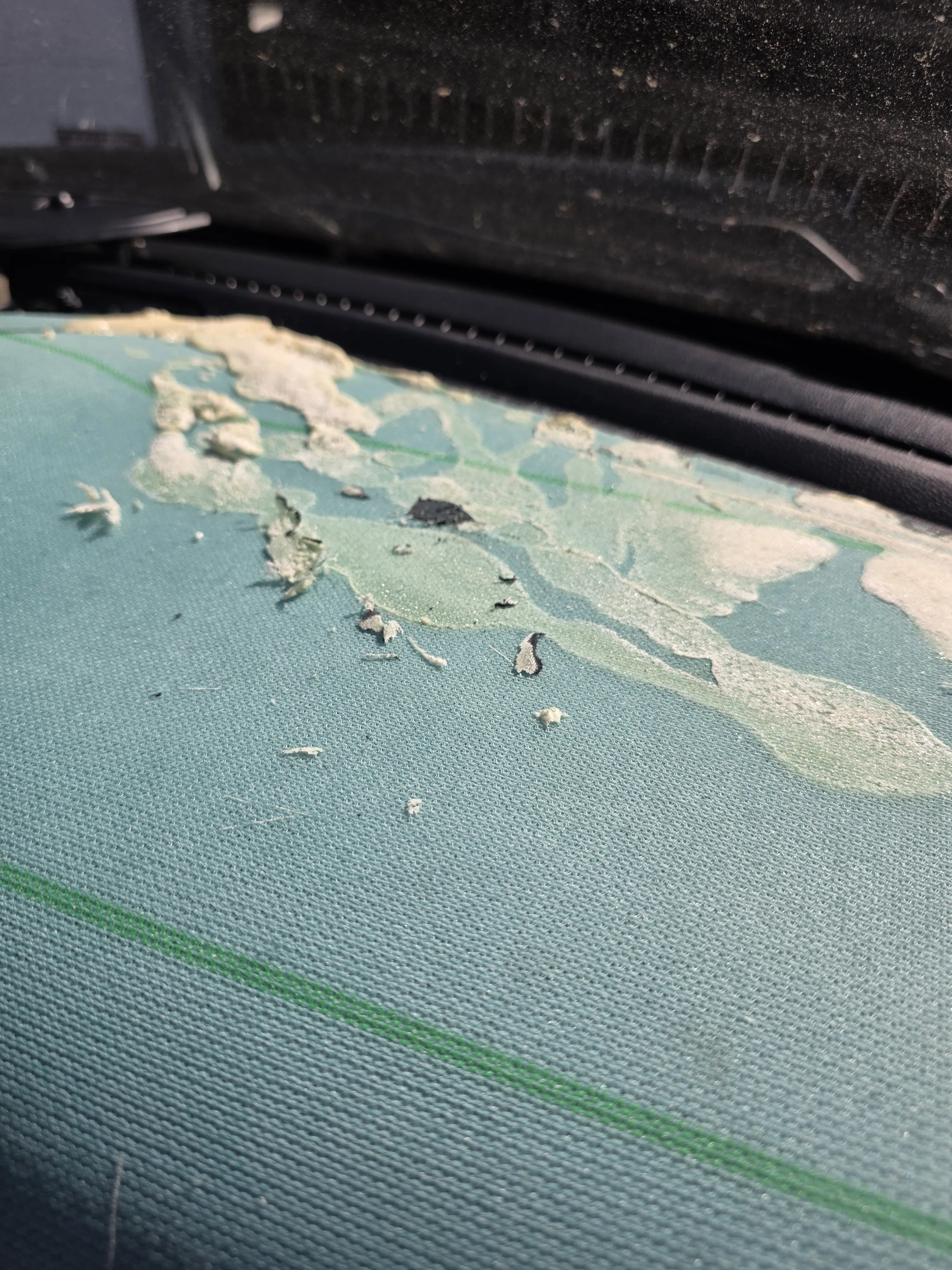 Sunroof shade — fabric broken up and flaking